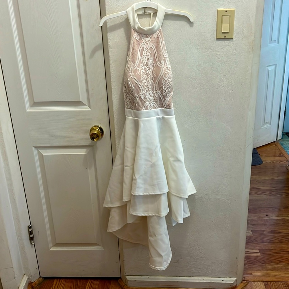 This was a prom dress worn once.  Could make a beautiful casual wedding dress.